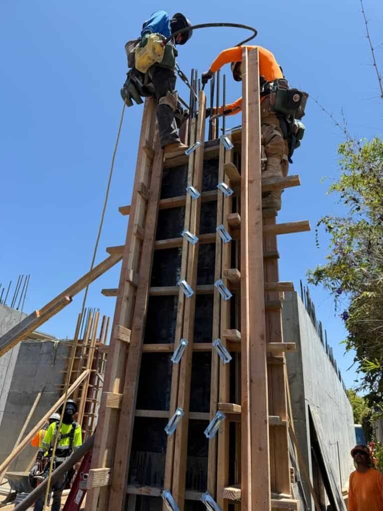 Reinforced concrete formwork construction for building foundations and columns.