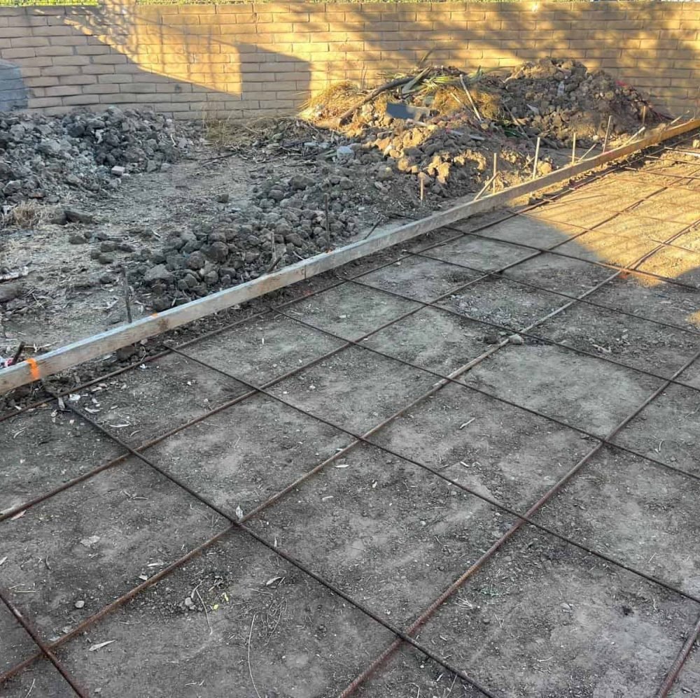 Reinforced concrete foundation preparation for construction project.