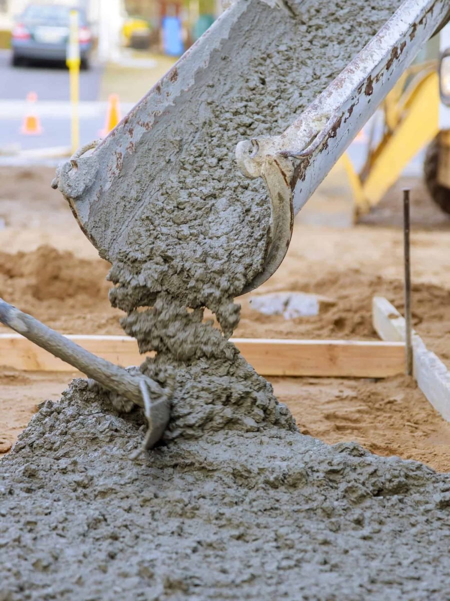 High-quality concrete being poured for foundation or slab at a construction project.